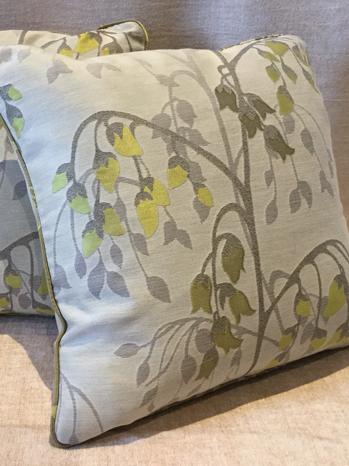 Piped feather cushions